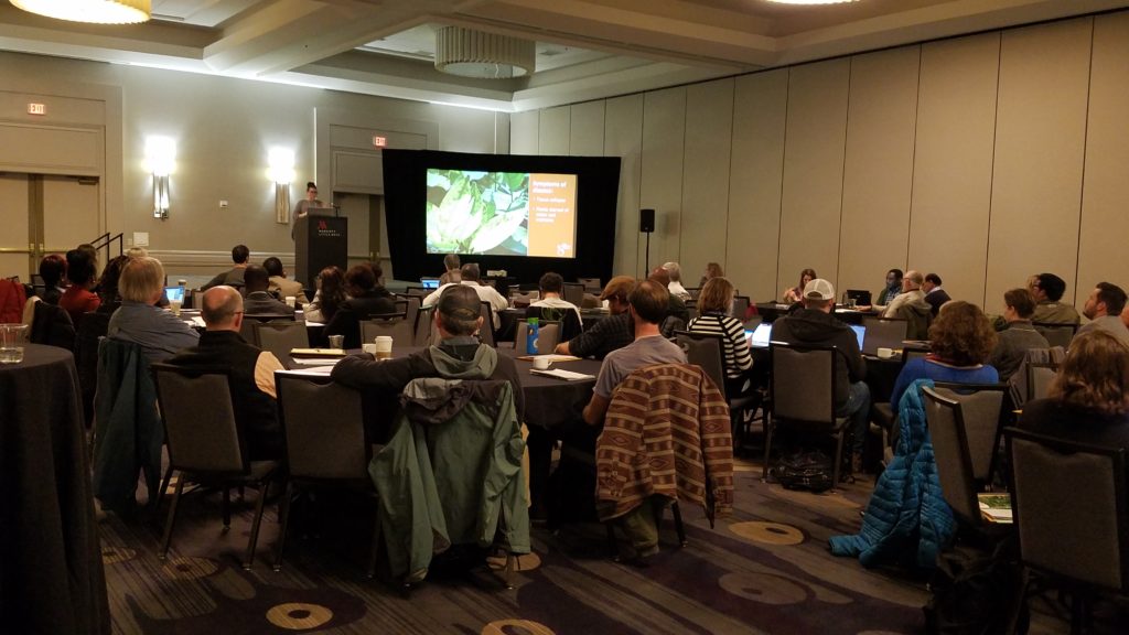 conference attendees listen to a presentation