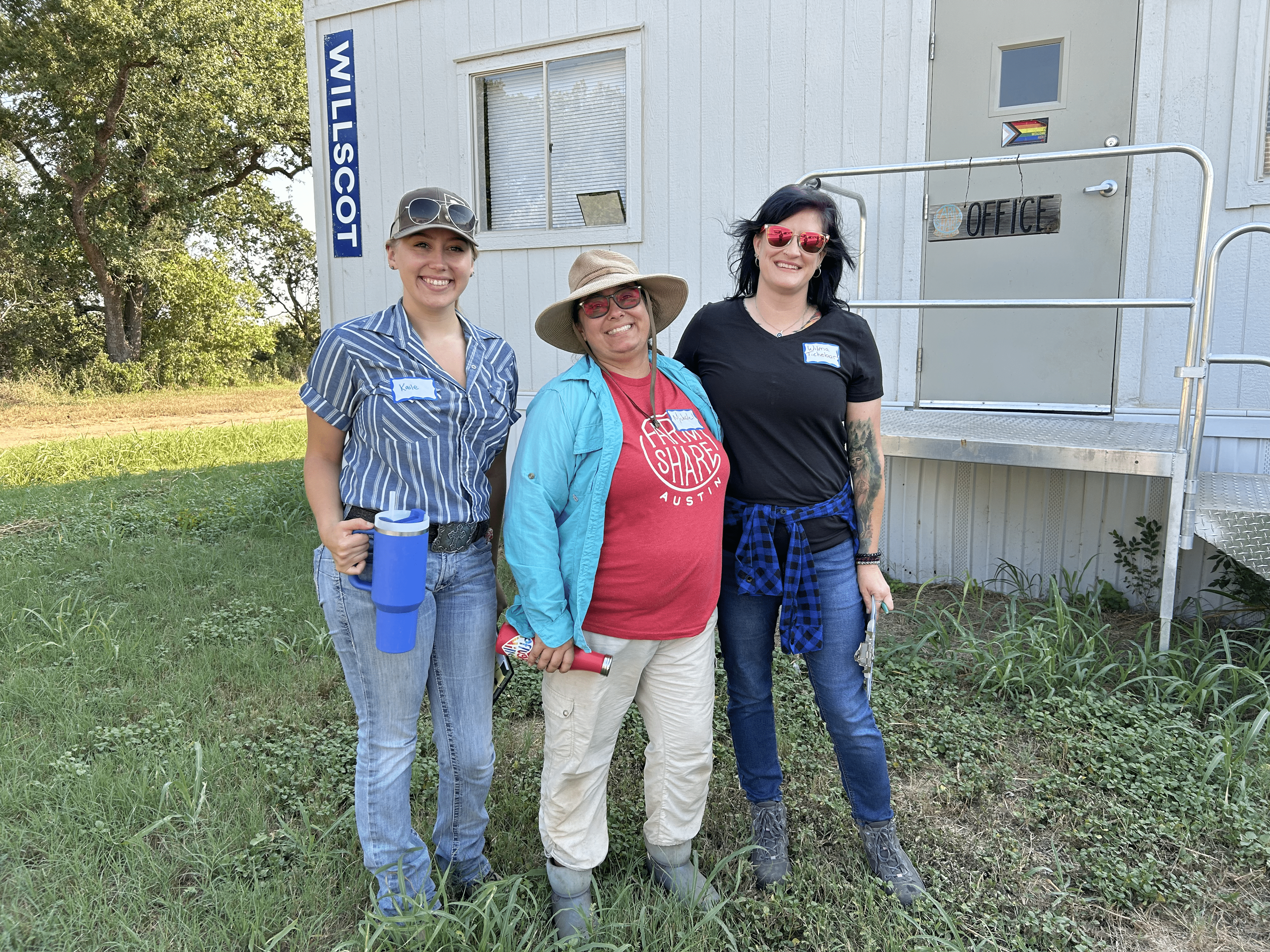 coordinators of field day posing for a photo, left to right, Kaile, Michelle, Wilma