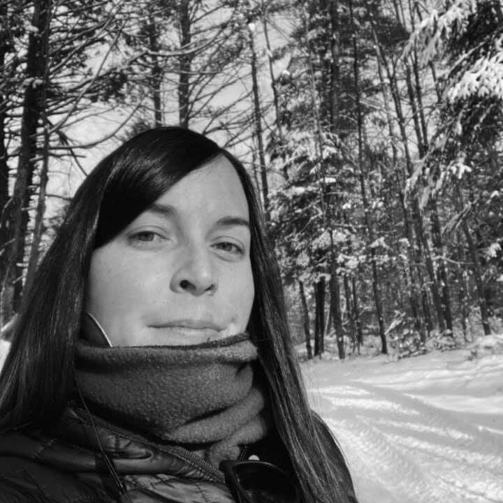 OFRF board member Carrie-Anne Palmeri in the woods in winter, black and white