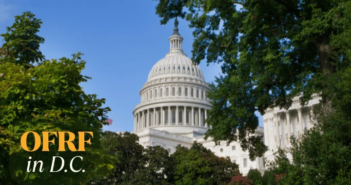 US Capitol through tress with "OFRF in DC" as text overlay in bottom left corner