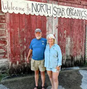 Alan and Cheryl Kobernik in front of North Star Organics