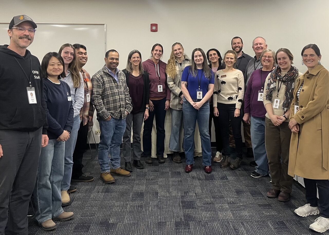 Organic researchers and OFRF staff pose during a Research and Extension Regional Meetup at a conference in 2026.