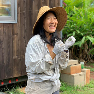 Farm of the Fearless Monkey_ Maigee Chang_Credit_Terri Dux Farmer Maigee Chang smiling at her farm.
