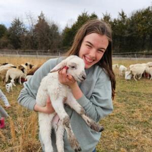 Chestnut Acres_Farmer Madeline Lucas with Lamb_FLT_2026