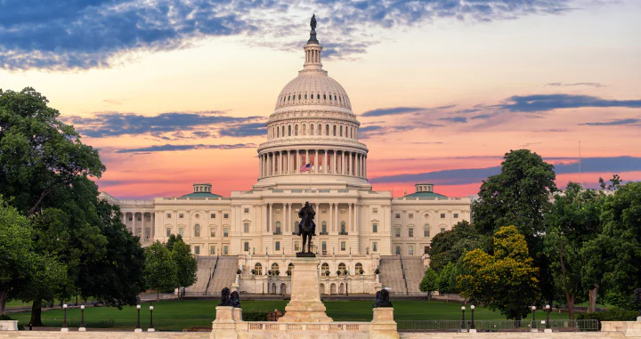The United States Capitol Building at sunset.