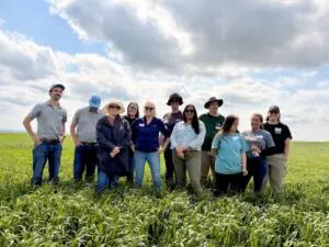 The Board of the Canada Organic Trade Association posing for a group picture at a farm.